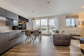 Shoreline Suite by Grandeur Property